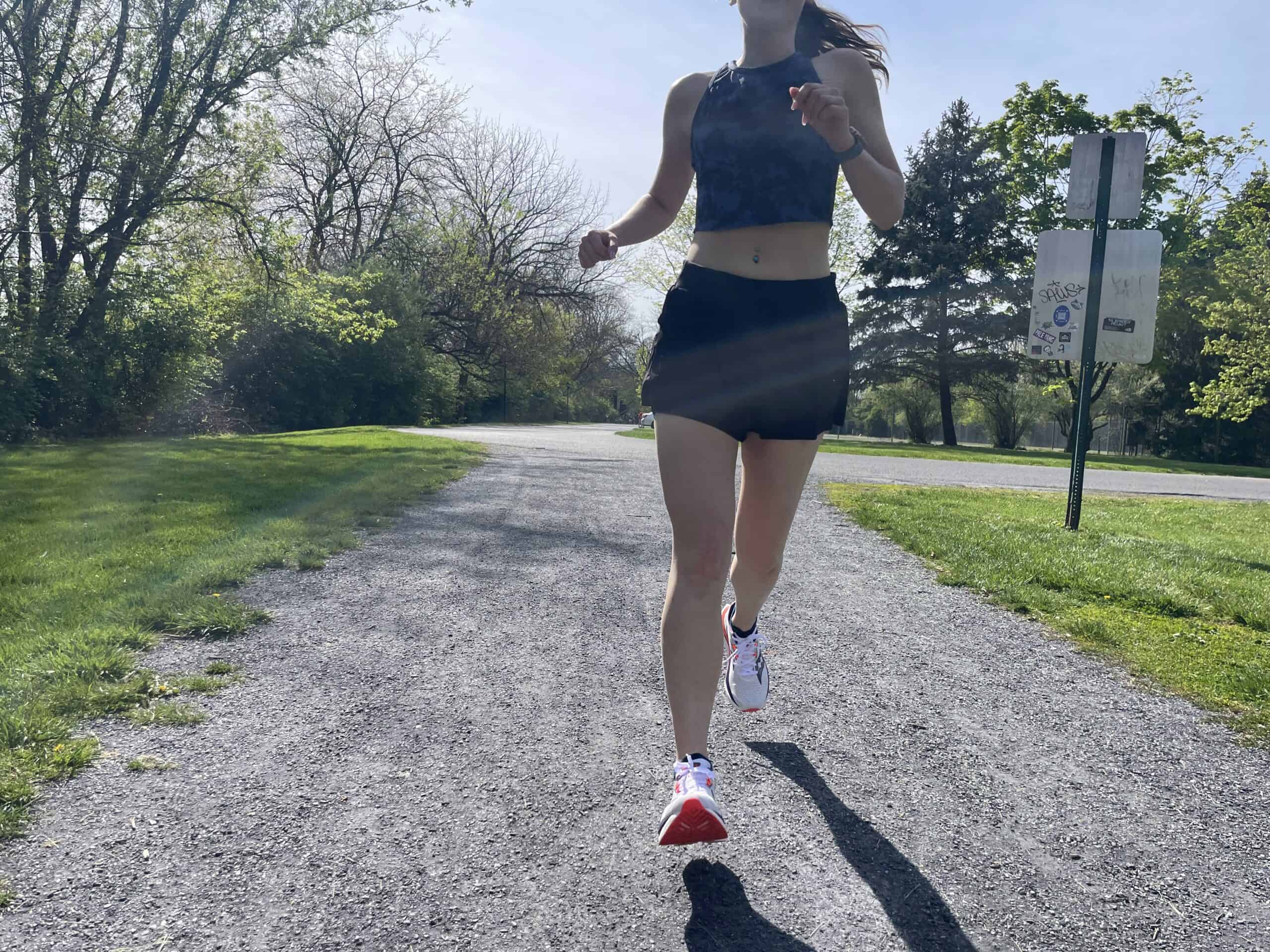 The writer running in Athleta run shorts, the Fast Route.