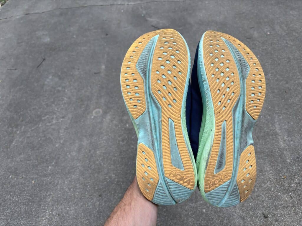 The bottom tread of Hoka Mach 6 running shoes after they've been worn.