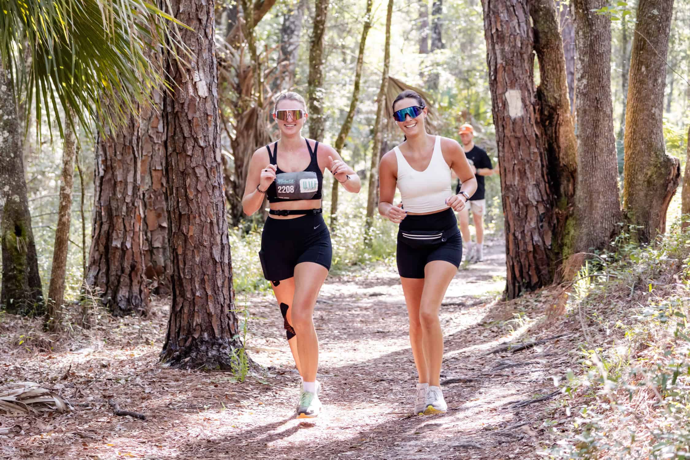 Two girls trail running during the Colt Creek Race.