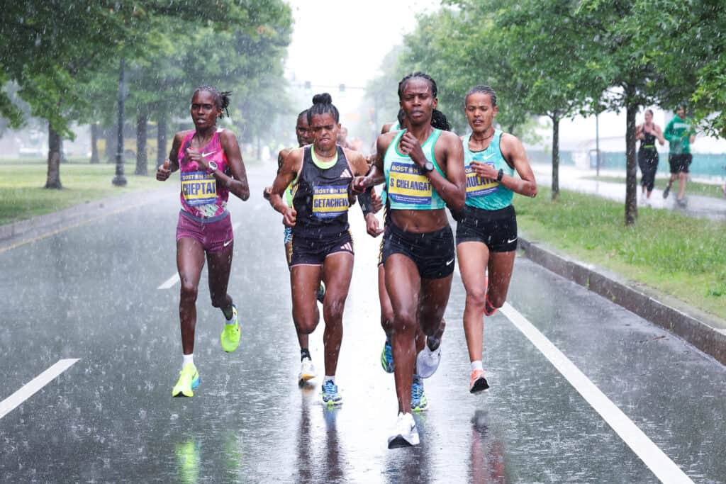 female runners leading the boston 10k race